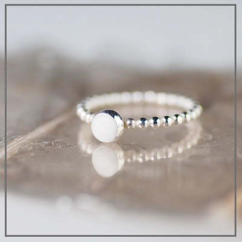 Balletjesring van Witgoud met Moedermelk