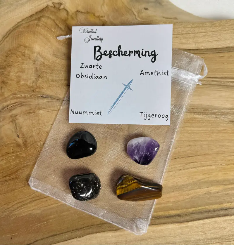 Bescherming trommelstenen zakje