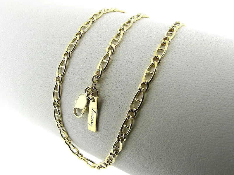 Gouden halsketting met platte fantasie figaro geslepen schakeltjes