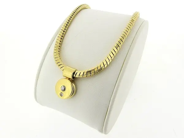 Gouden ketting met hangertje facet geslepen slangen ketting