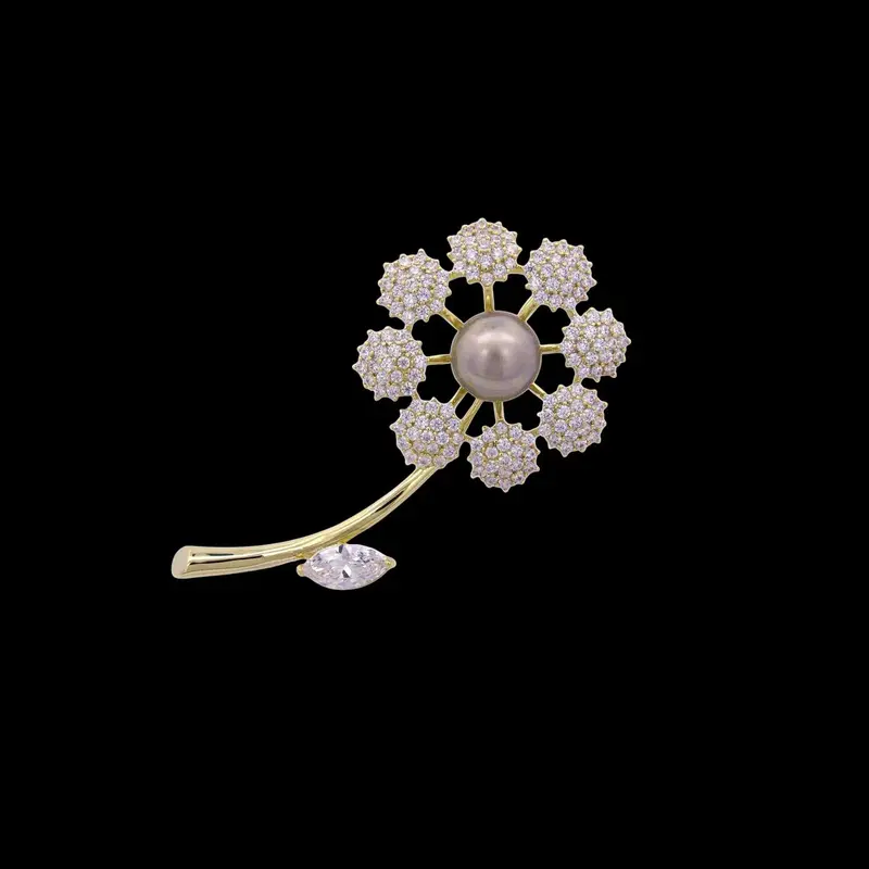 Goudkleurige Bloem Broche en Hanger met Imitatie Tahitiparel en Zirkonia Stenen