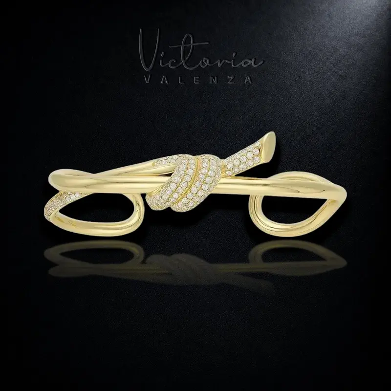 Goudkleurige Knot Armband met Zirkonia Stenen