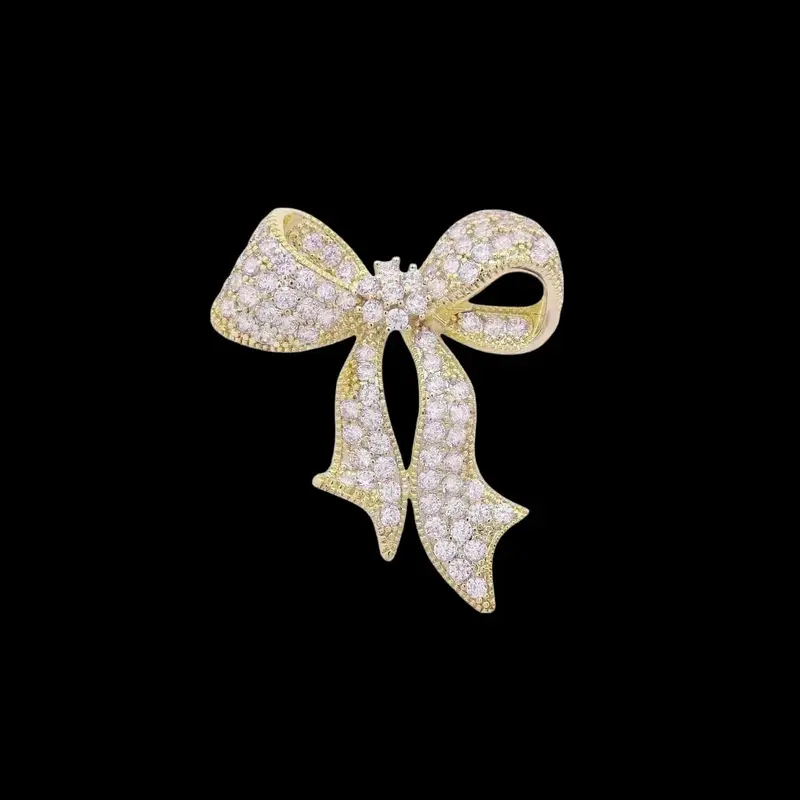 Goudkleurige Strik Broche met Pavé Zirkonia Stenen
