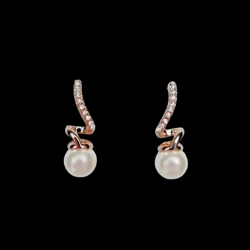 Roségoudkleurige Twist Oorbellen met Parels en Zirkonia Stenen