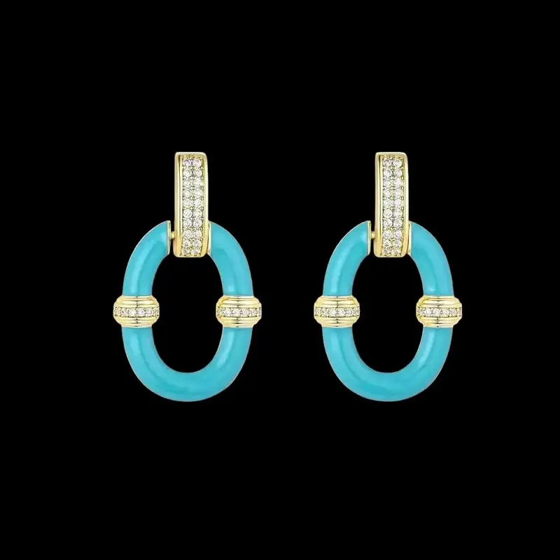 Vergulde ovale oorbellen met blauwe emaille en zirkonia stenen