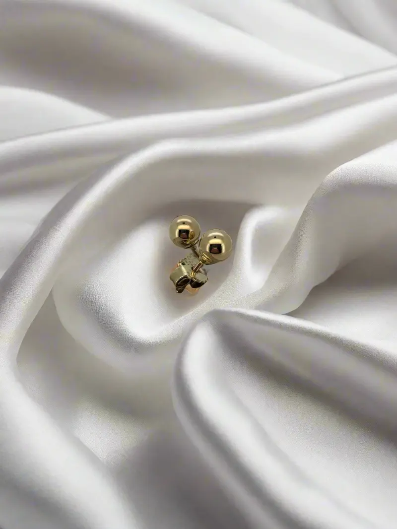 vintage gouden oorbellen bolletjes 14K 1gr