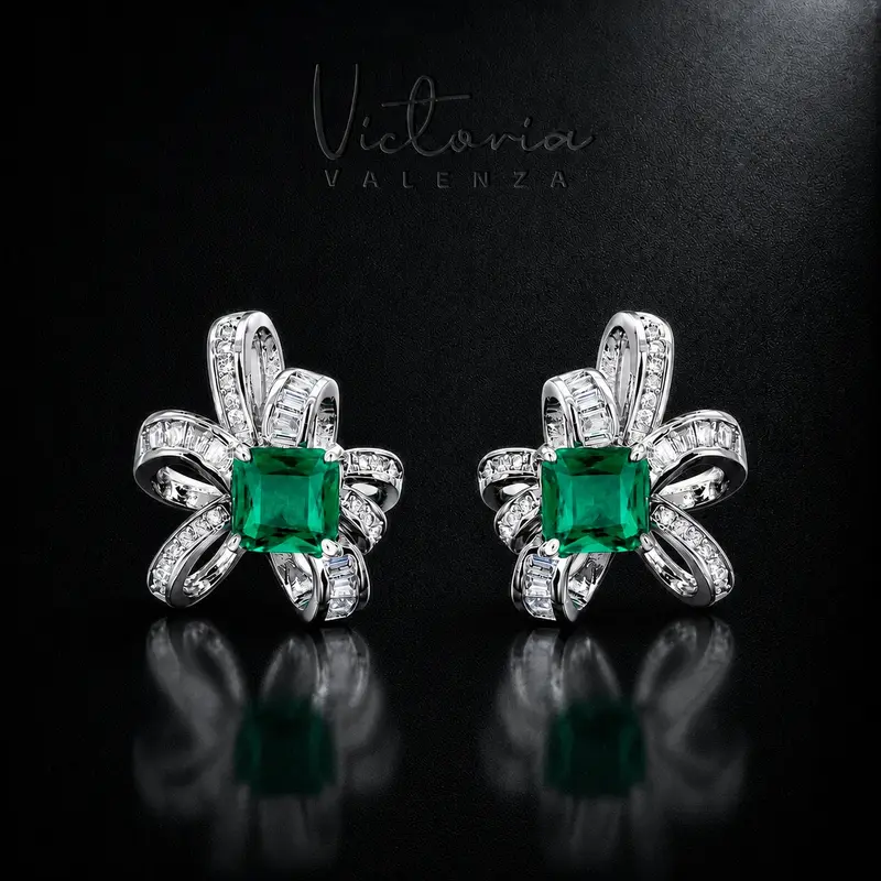 Zilverkleurige Emerald Bow Oorbellen met Groene Zirkonia Stenen