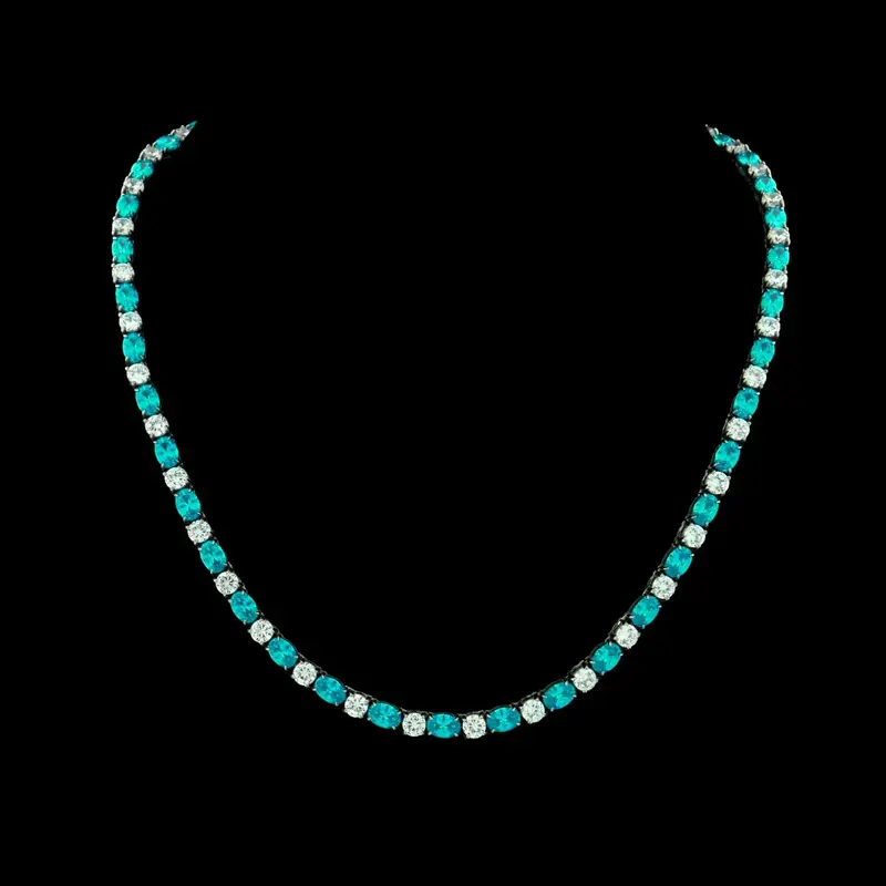 Zilverkleurige RVS Tenniscollier met Ovale Blauwe Zirkonia