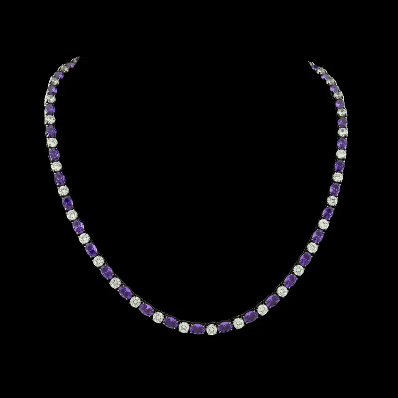Zilverkleurige RVS Tenniscollier met Ovale Paarse Zirkonia Stenen