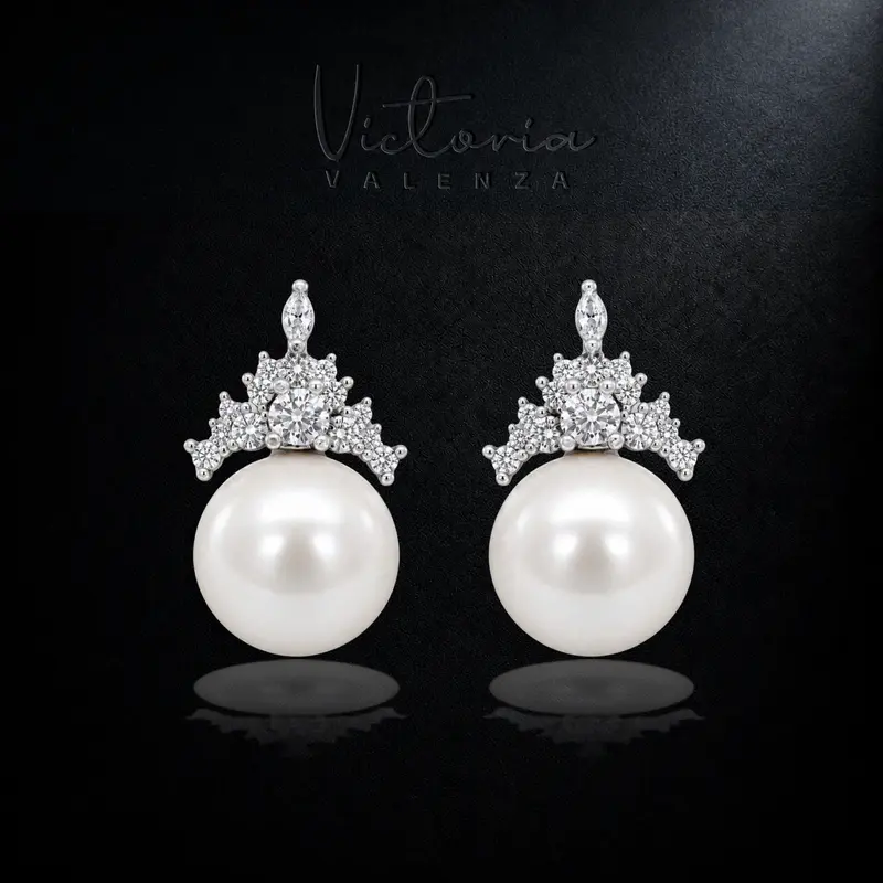 Zilverkleurige Tiara Clip Oorbellen met Parels en Zirkonia Stenen